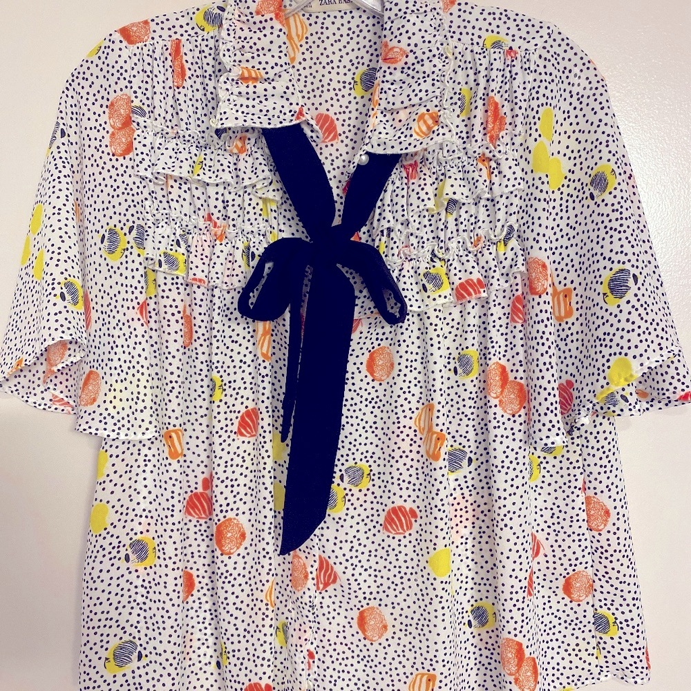 Faux silk blouse with black tie